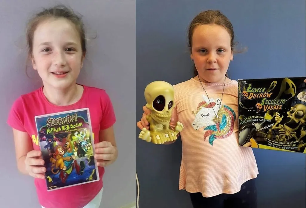 Obraz przedstawia naszych wychowanków, którzy trzymają nagrody za osiągnięcia w konkursach organizowanych na portalu sieciaki.